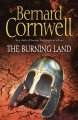 The burning land  Cover Image